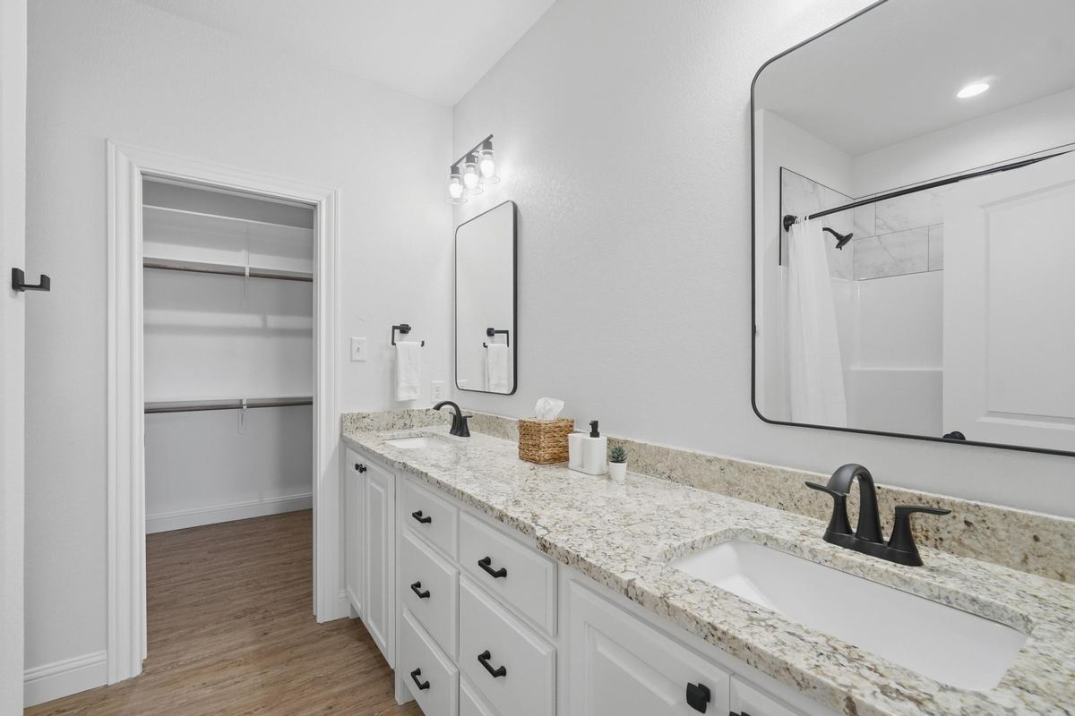 Clean modern bathroom in a furnished monthly stay home in Abilene