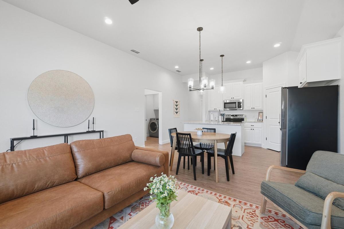 Open living and dining area in a furnished monthly housing home in Abilene